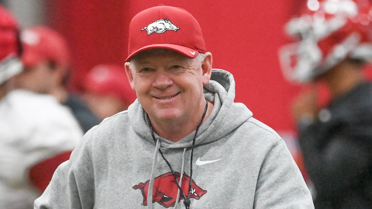 New Razorbacks offensive coordinator Bobby Petrino at practice Thursday